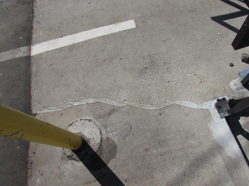 Filled concrete crack after repair